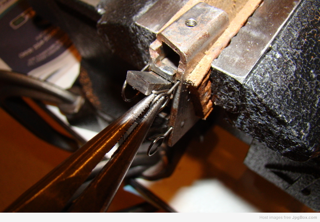 pulling the sear reset spring