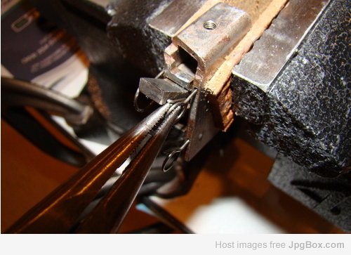 pulling the sear reset spring