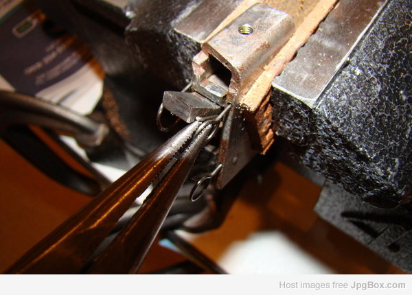 pulling the sear reset spring
